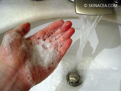 Washing face with soap